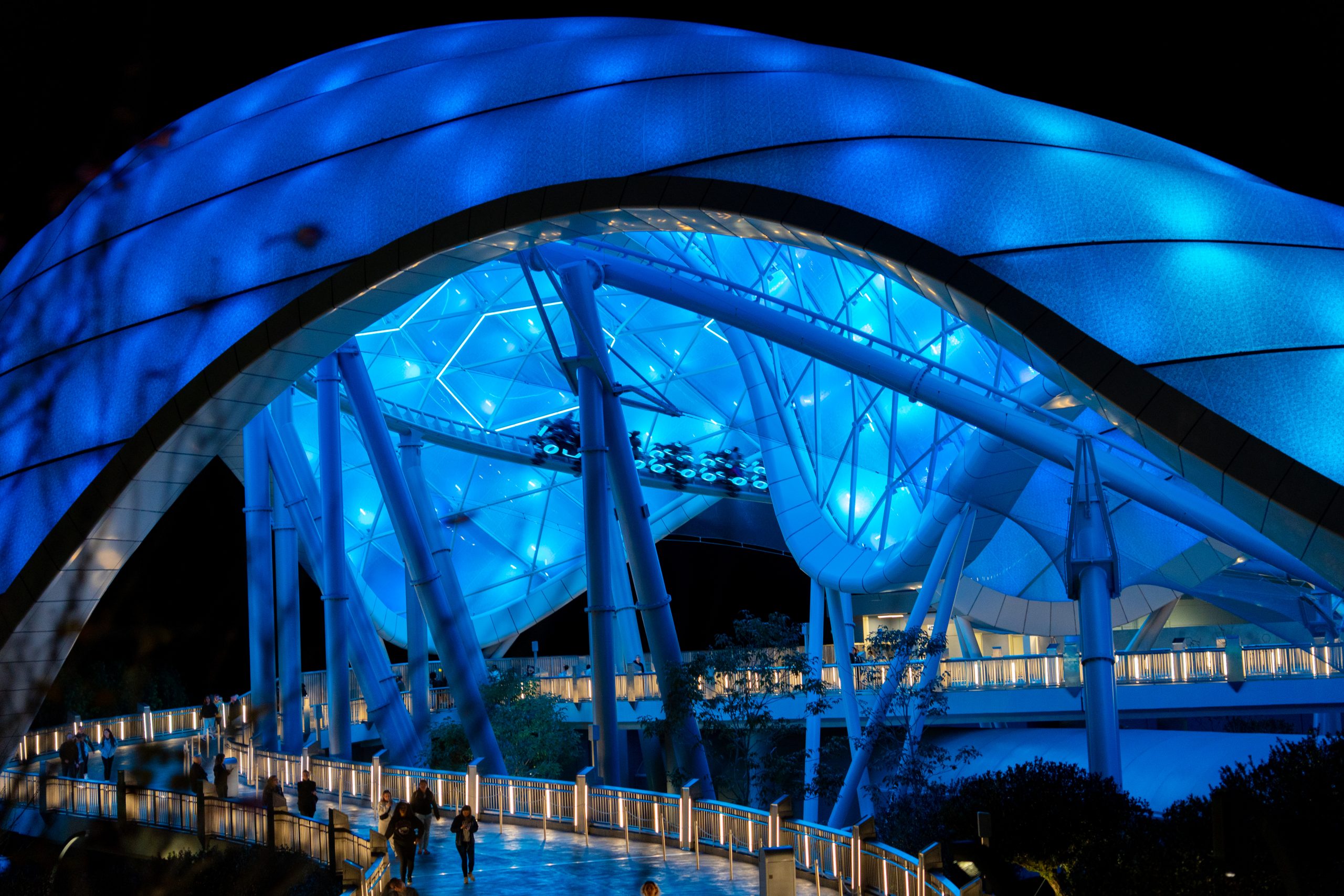 TRON Lightcycle / Run coaster exterior at night