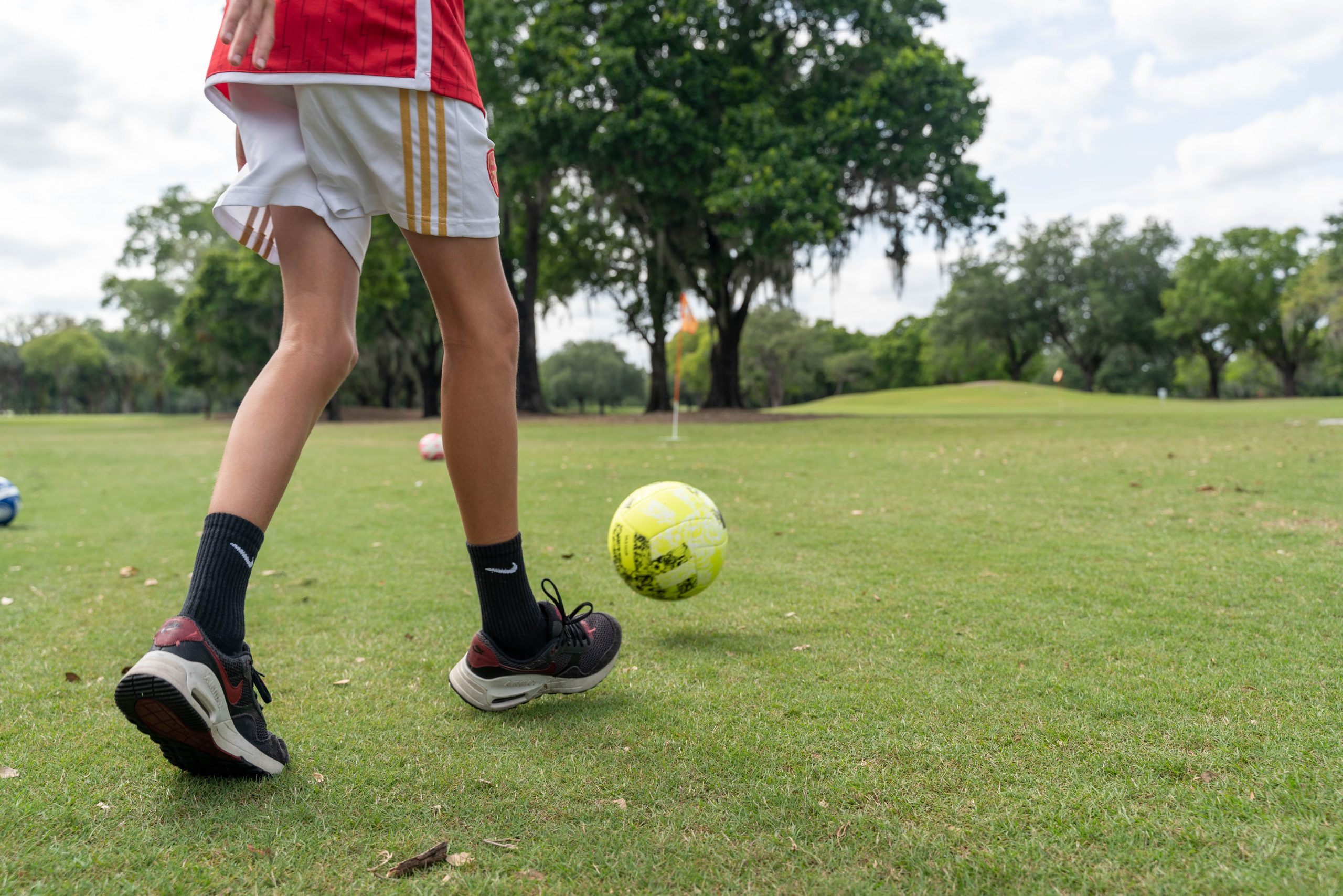 FootGolf at Disney World, Oak Trail Golf Course kid with soccer ball