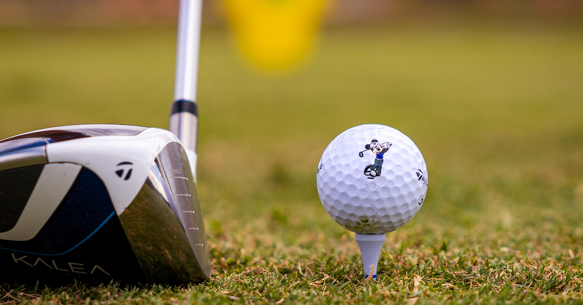 Golf at Walt Disney World, Mickey golf ball on tee with golf club