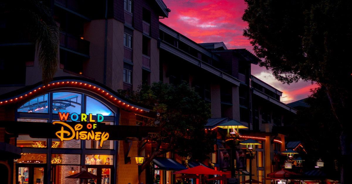 Downtown Disney at sunset, pink sky against World of Disney store