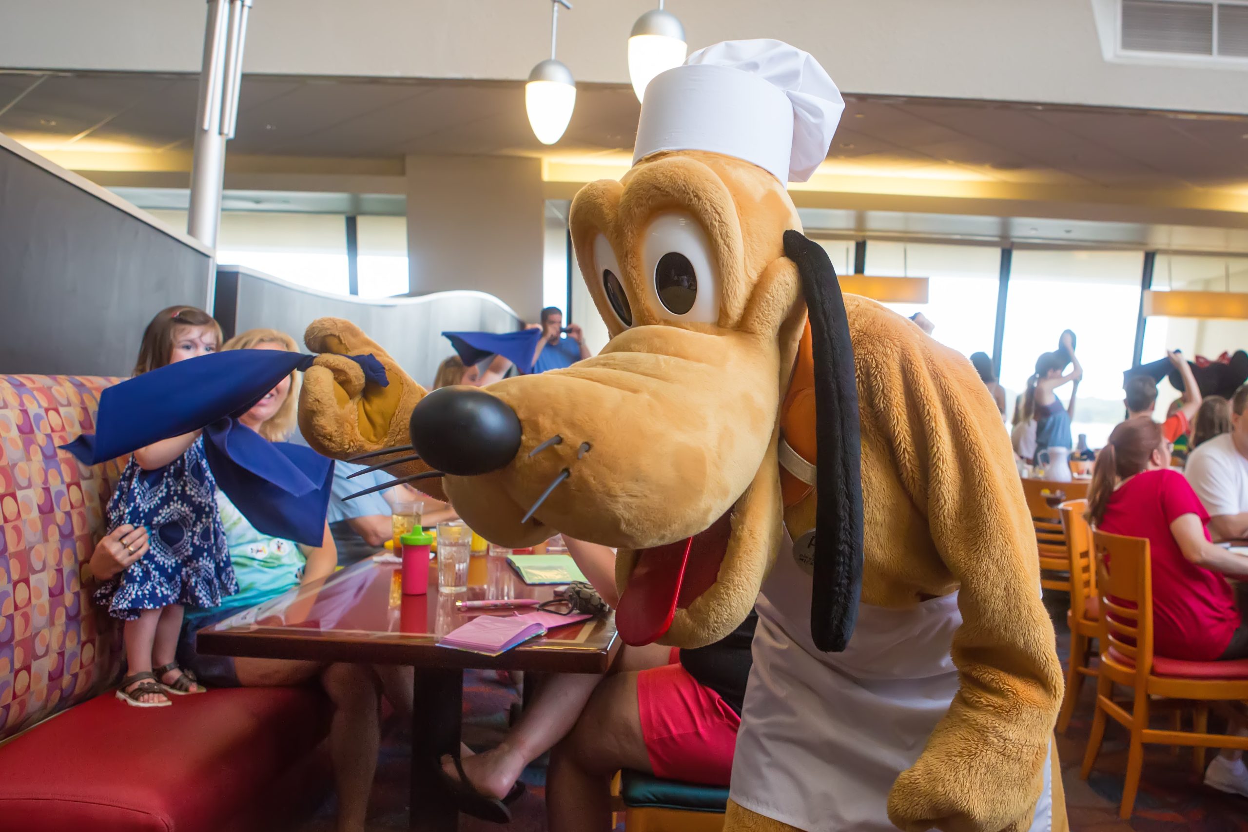 Meet Pluto at Chef Mickey's