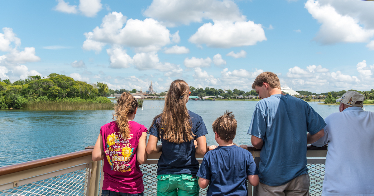 Managing Expectations for Disney World, family on ferry headed to Magic Kingdom